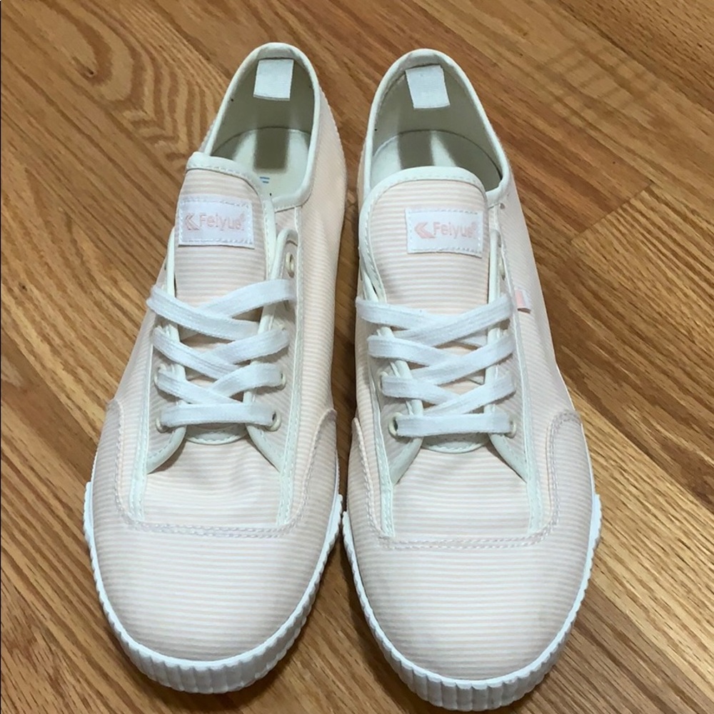 Pink and white striped sneakers